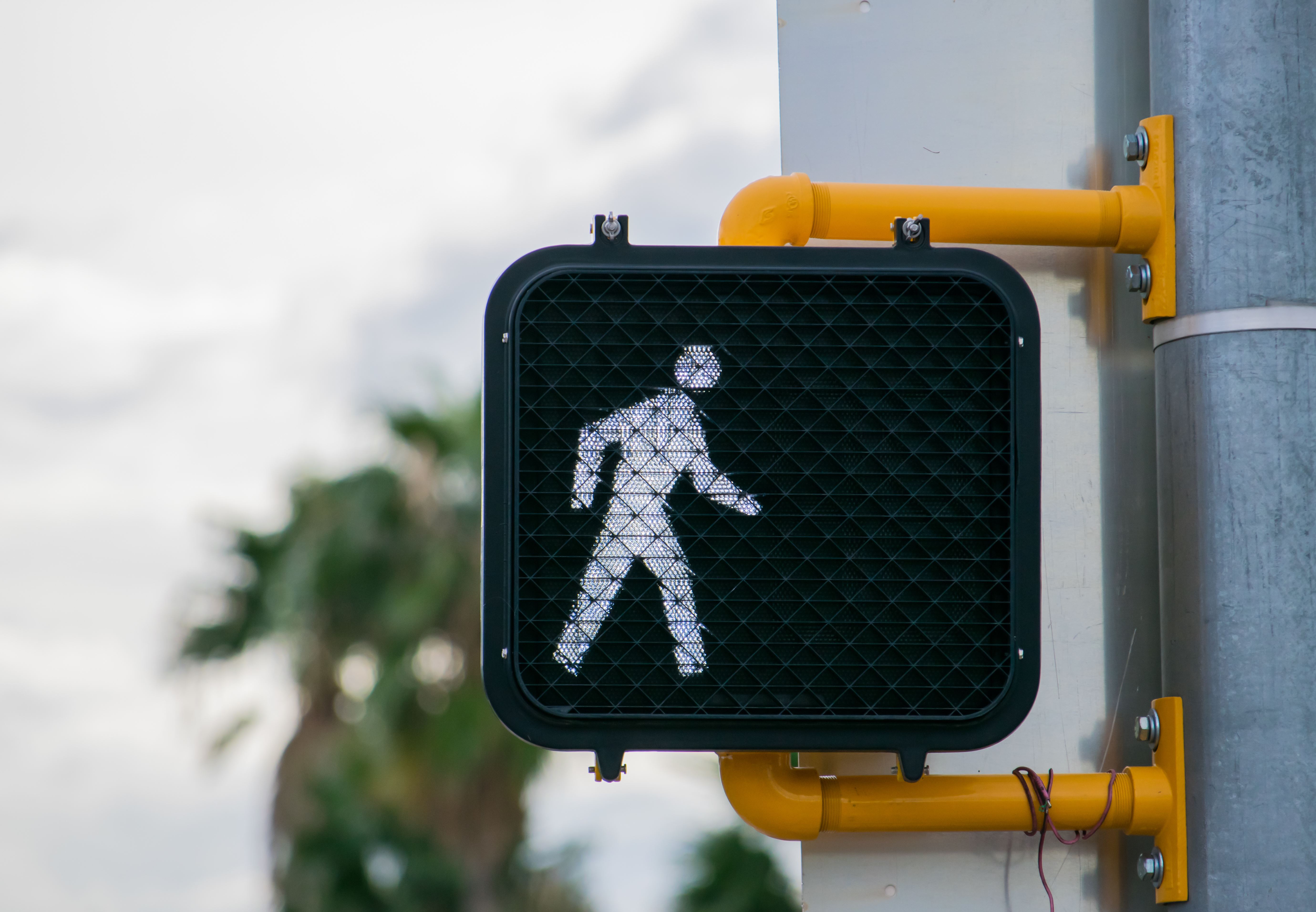 Pedestrian crossing street sign